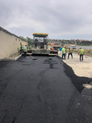 Növbəti asfaltlanma işləri Əmircan qəsəbəsində aparılır